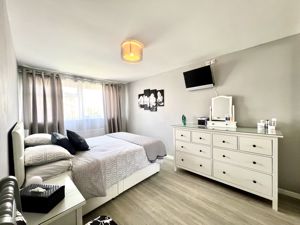 Bedroom One- click for photo gallery